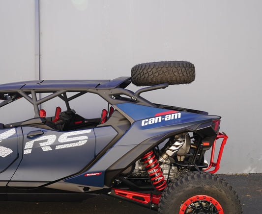 Side view of a Can-Am XRS off-road vehicle against a plain background