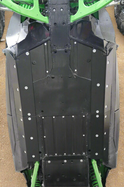 Close-up of a vehicle's undercarriage with visible suspension and body rock slider