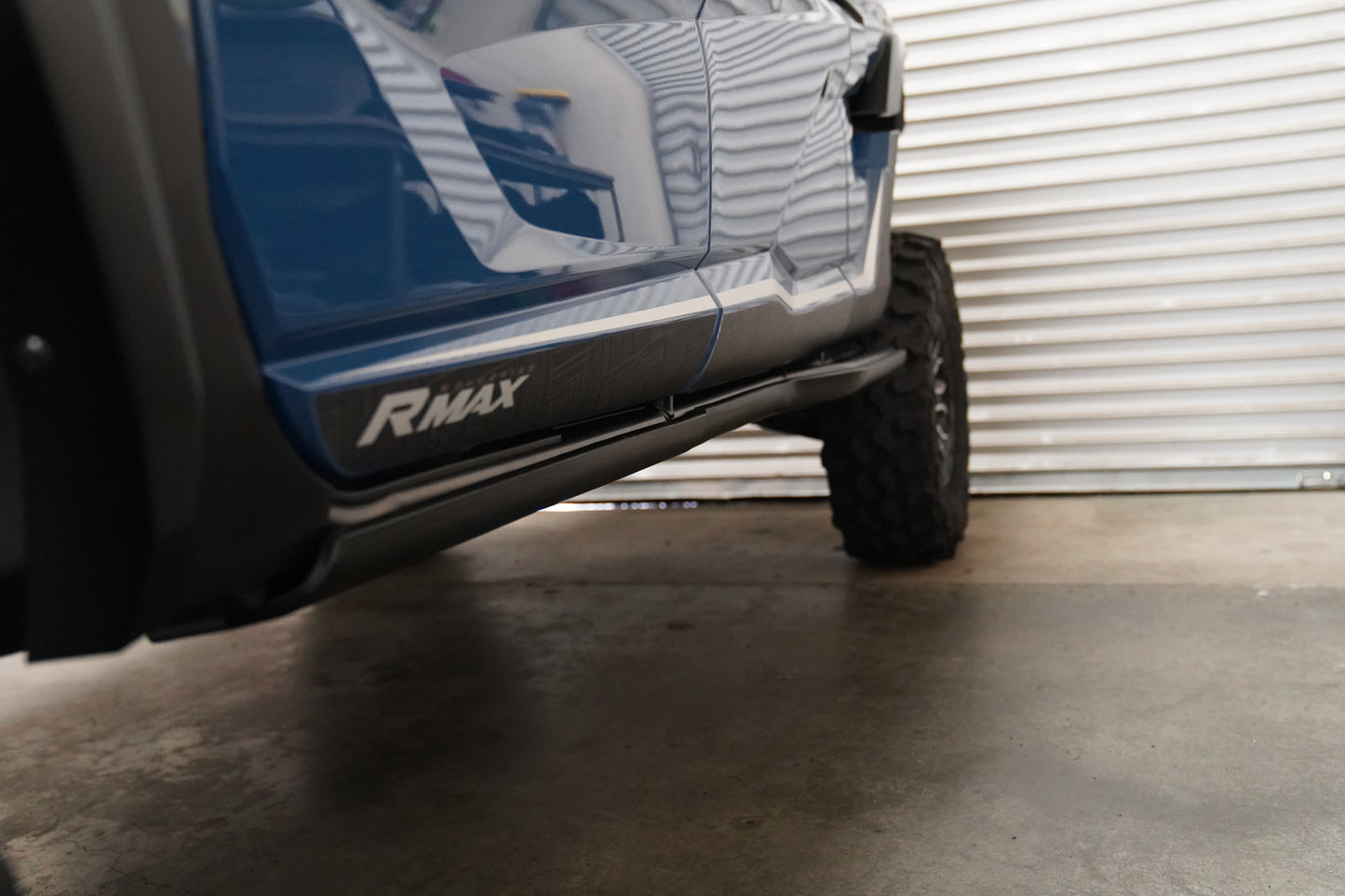 Heavy-duty UHMW rock sliders designed to protect the Yamaha Wolverine RMAX4 from rocks and trail damage.