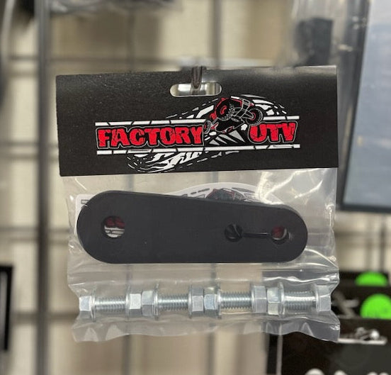 Metal component in packaging with 'Factory UTV' branding on a display rack.