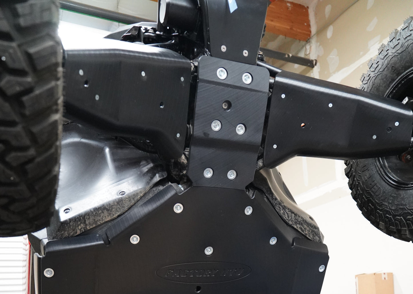 UHMW front A-Arm Guards protecting Polaris RZR XP S 1000 suspension