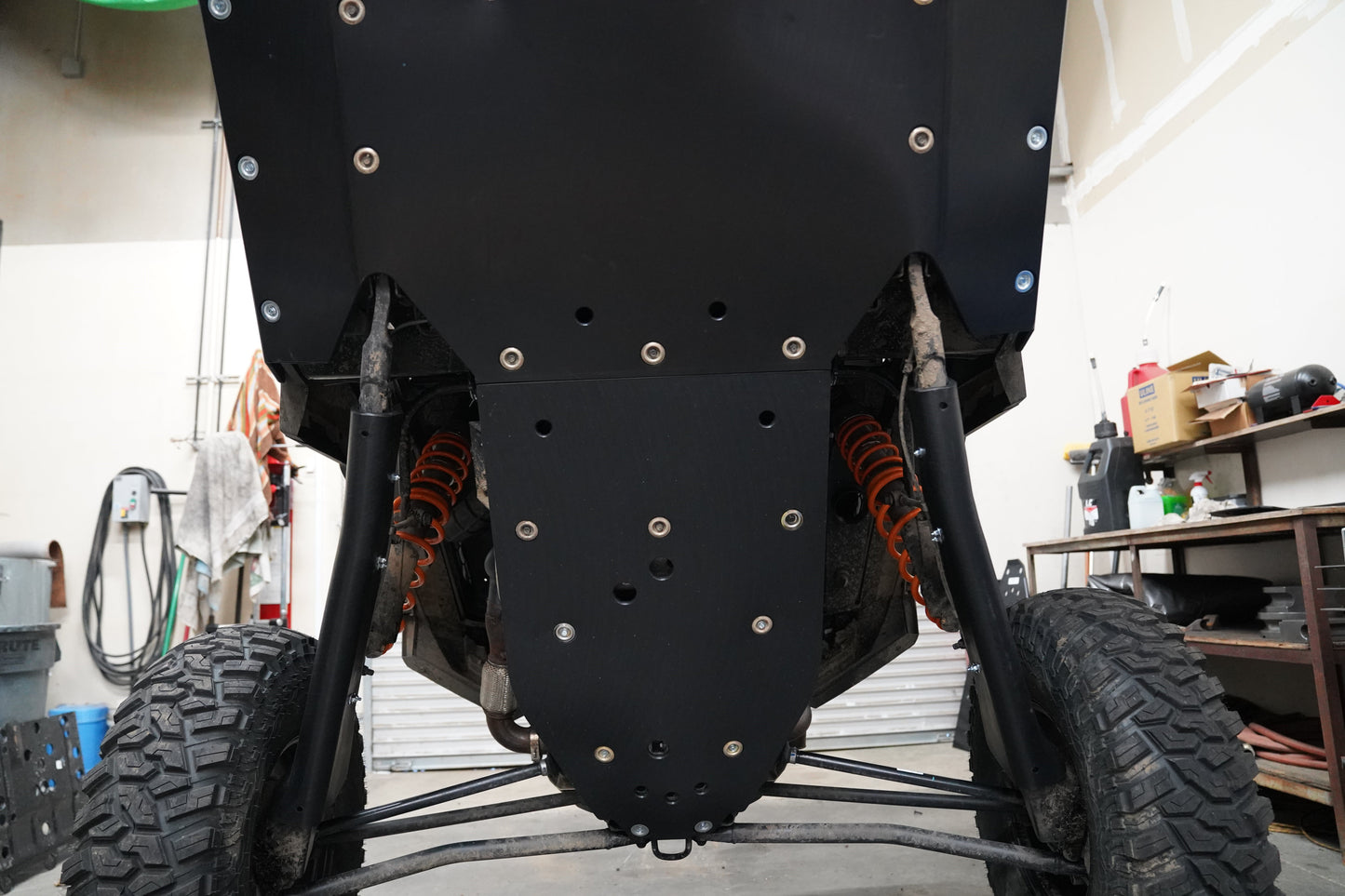Factory UTV UHMW Trailing Arm Guards installed on Polaris RZR XP S 1000