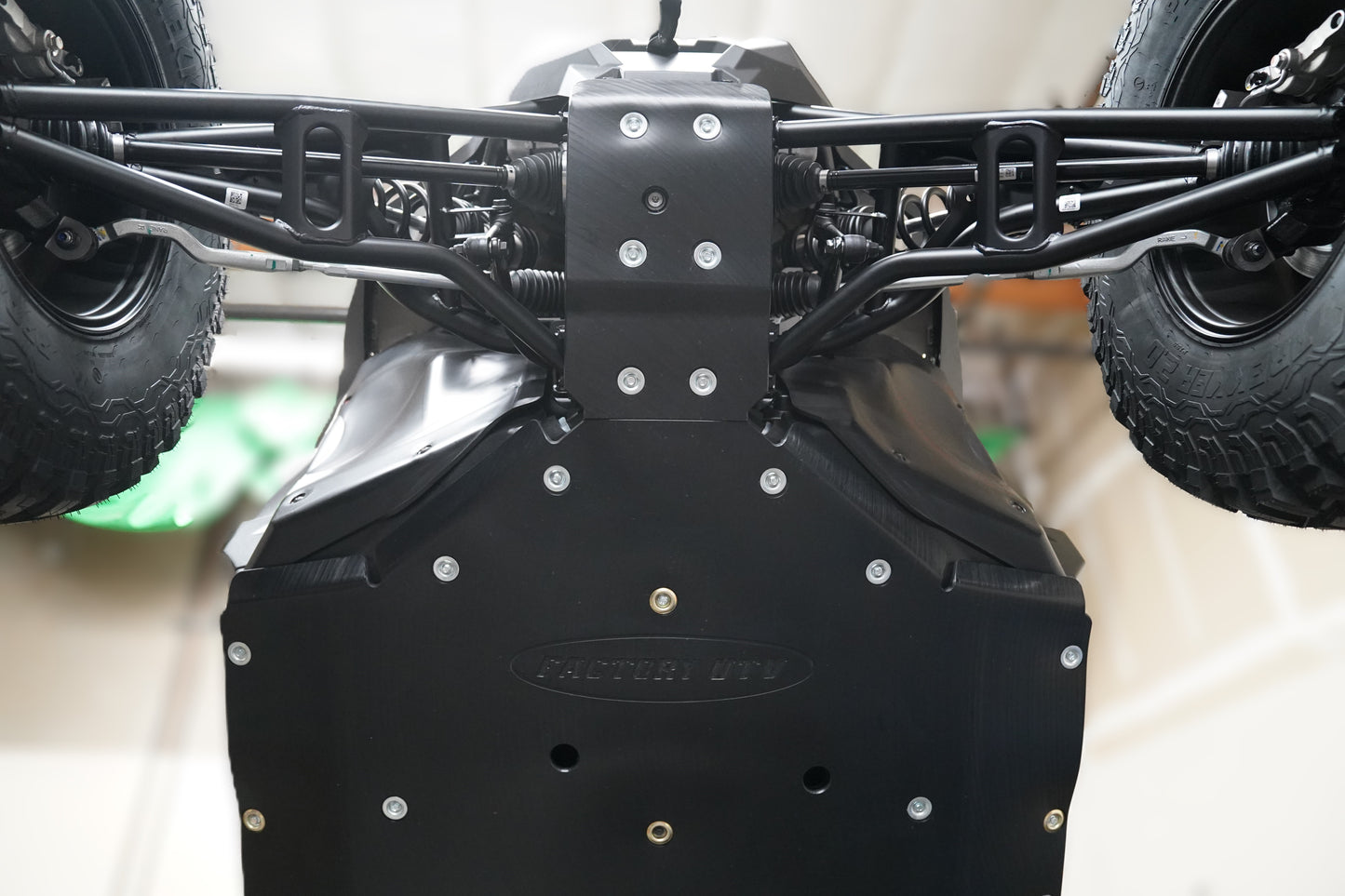 Heavy-duty UHMW skid plate installed on Polaris RZR XP S 4 1000