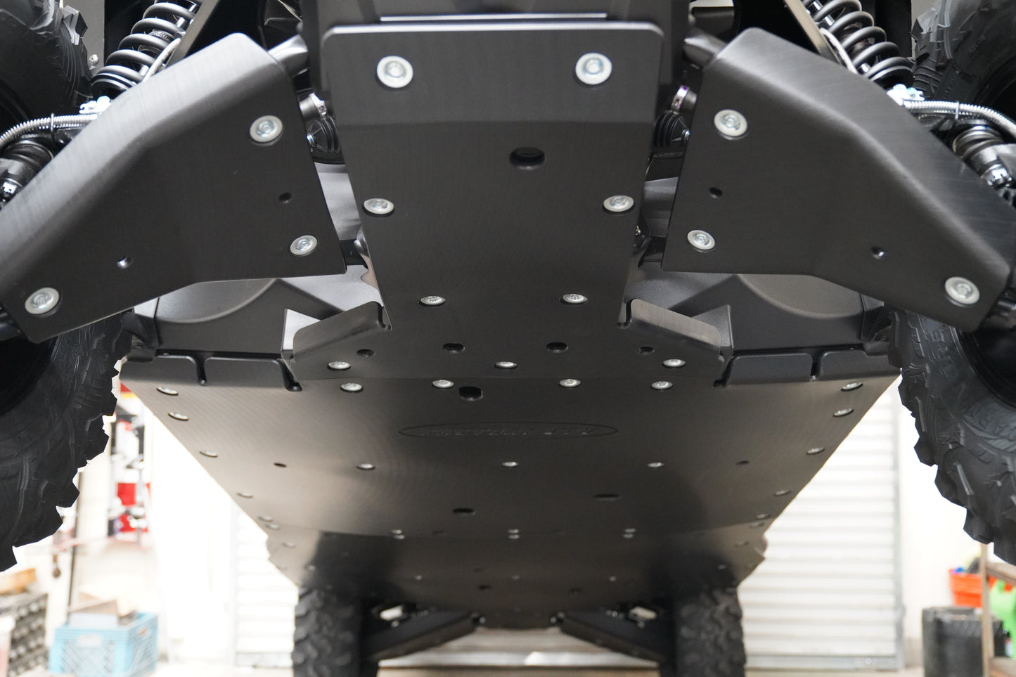 UHMW front A-Arm Guards protecting Yamaha Wolverine RMAX 4 2025+ suspension