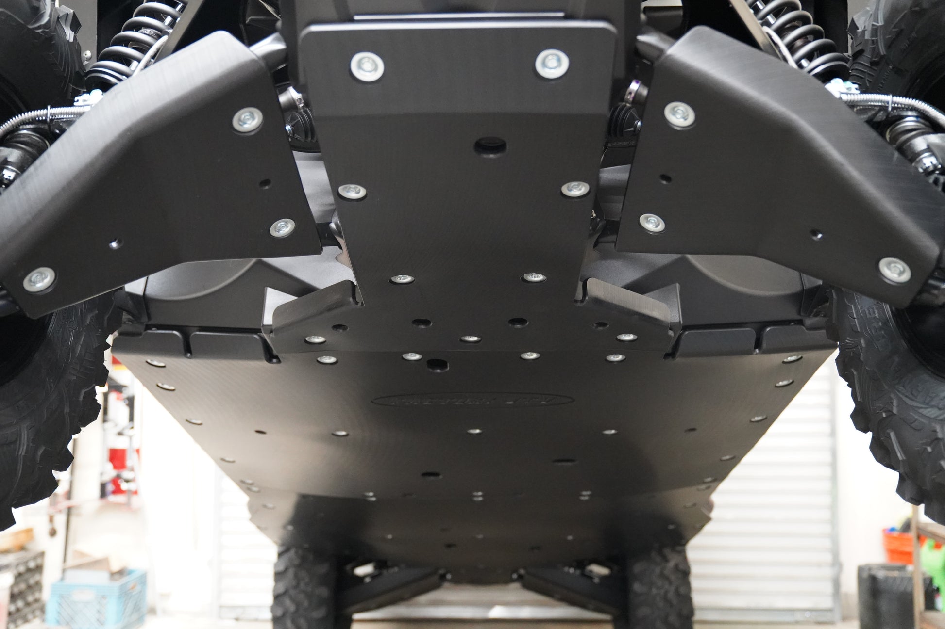 UHMW front A-Arm Guards protecting Yamaha Wolverine RMAX 4 2025+ suspension