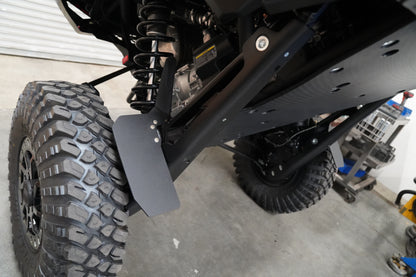 Factory UTV UHMW Trailing Arm Guards providing full suspension protection.