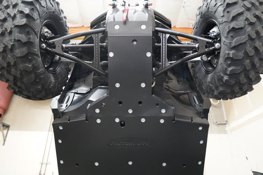 Front UHMW skid plate protecting underside of Yamaha RMAX4 1000